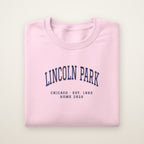Lincoln Park Chicago Home 2026 Embroidered Crewneck — Navy Thread on Light Pink