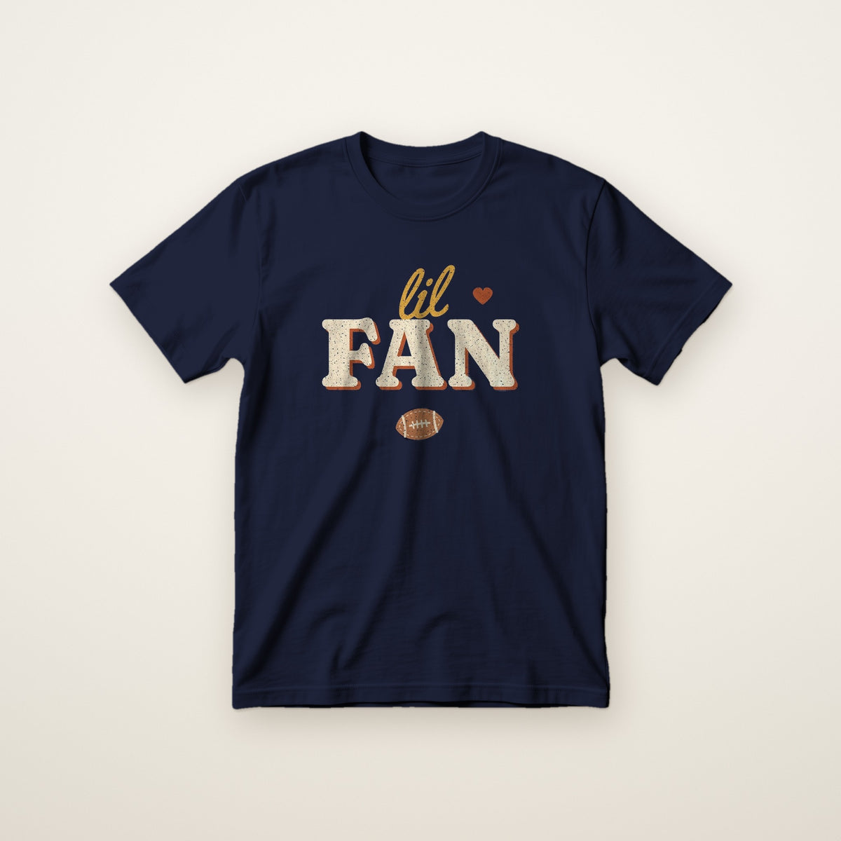 Lil Fan Toddler Tee in Navy, flat lay on ivory