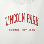 Close-up of red satin-stitch Lincoln Park embroidery