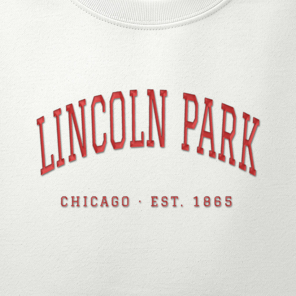 Close-up of red satin-stitch Lincoln Park embroidery