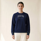Model wearing the Lincoln Park Chicago Embroidered Crewneck — White Thread in Navy