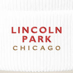 Lincoln Park Chicago embroidery close-up in red and old gold thread