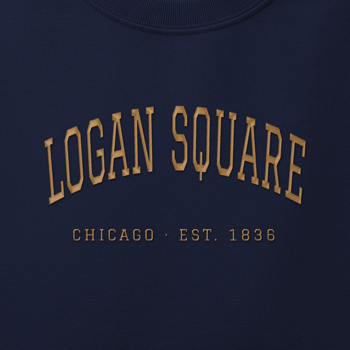 Close-up of gold satin-stitch Logan Square embroidery