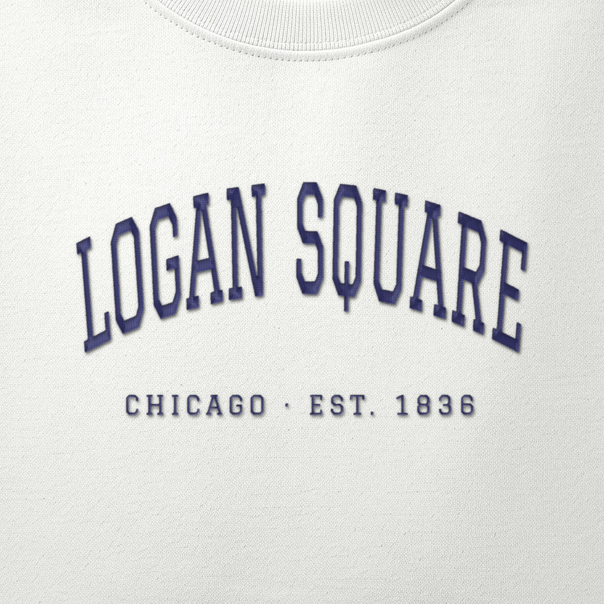 Close-up of navy satin-stitch Logan Square embroidery