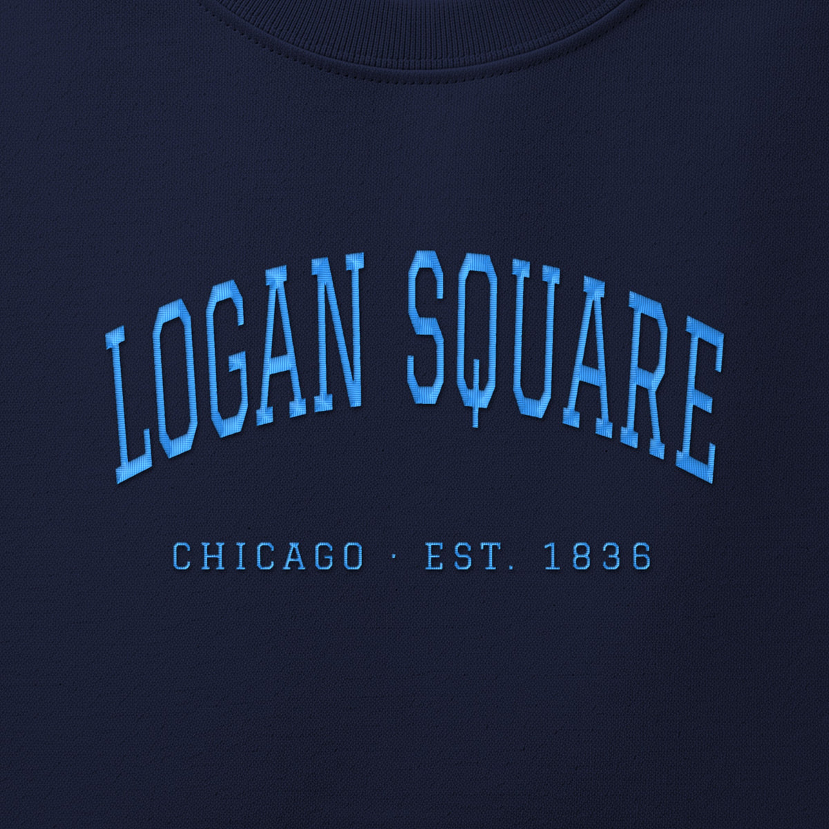 Close-up of sky blue satin-stitch Logan Square embroidery