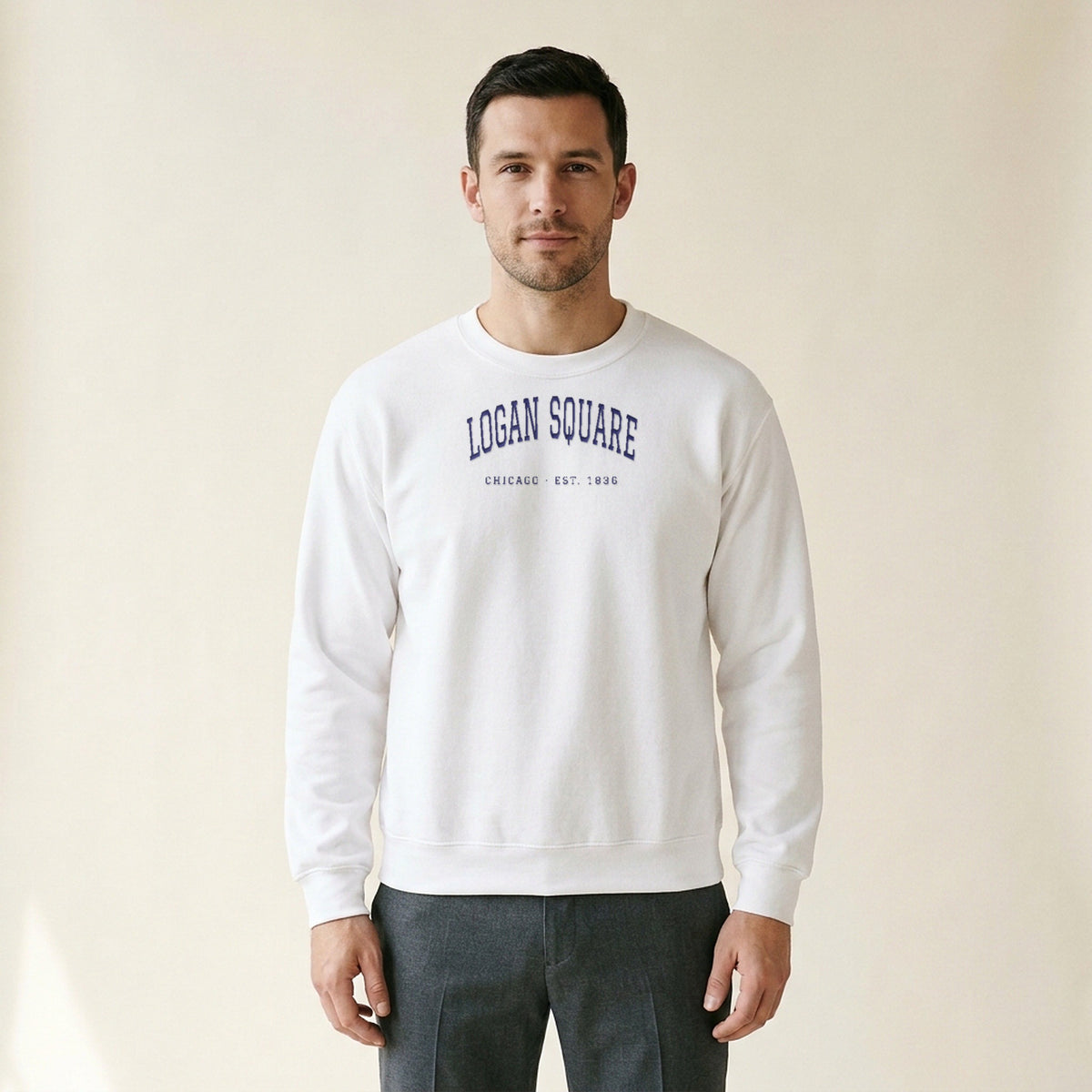 Model wearing the Logan Square Chicago Embroidered Crewneck — Navy Thread in White