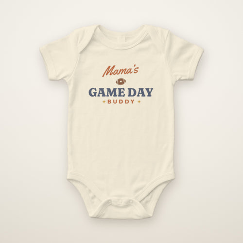 Mama's Game Day Buddy Bodysuit in Natural, flat lay on ivory