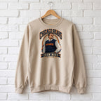 Mike Ditka "Iron Mike" Crewneck Sweatshirt — sand crewneck on a wooden hanger