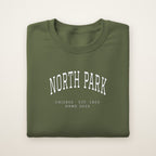 North Park Chicago Home 2026 Embroidered Crewneck — White Thread on Military Green