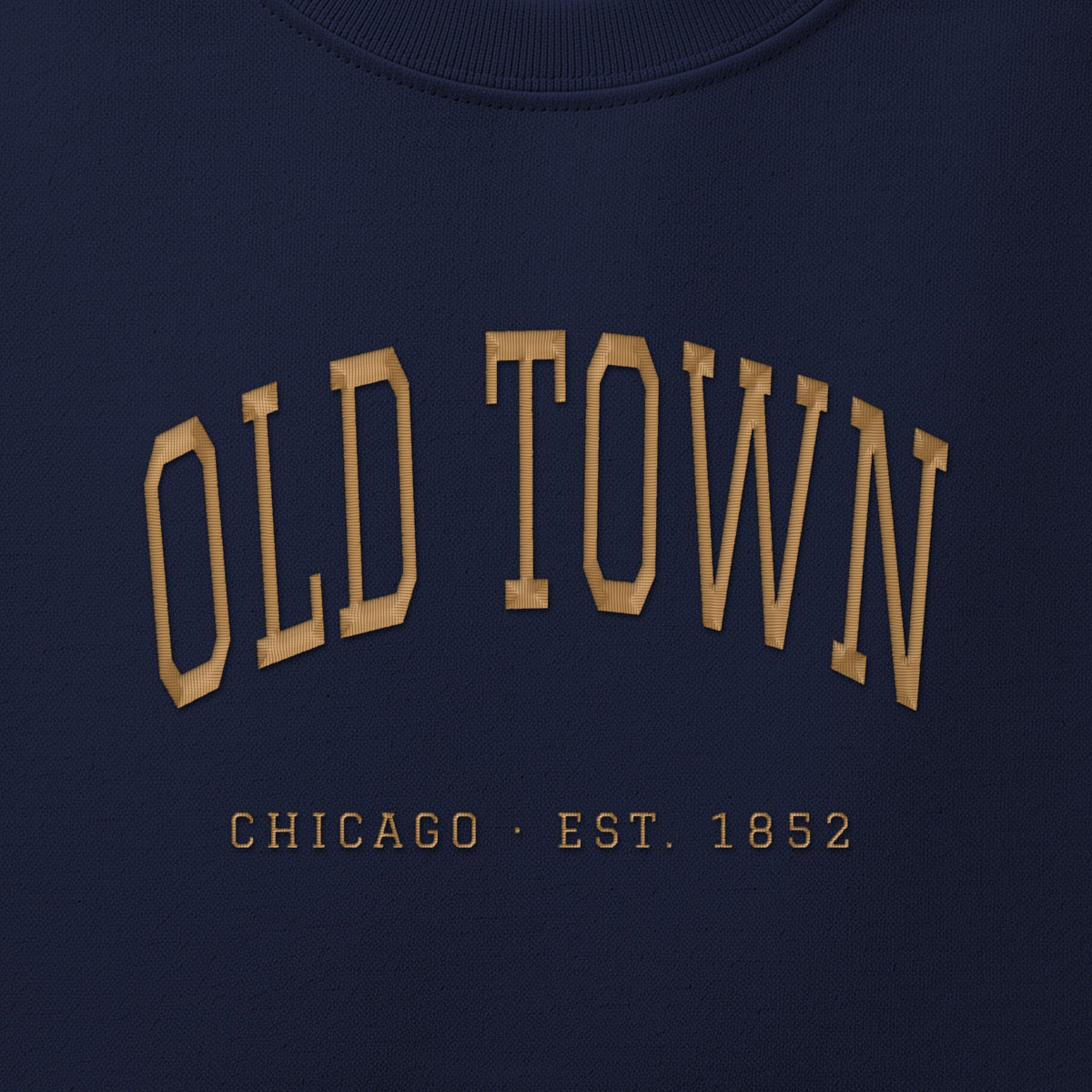 Close-up of gold satin-stitch Old Town embroidery