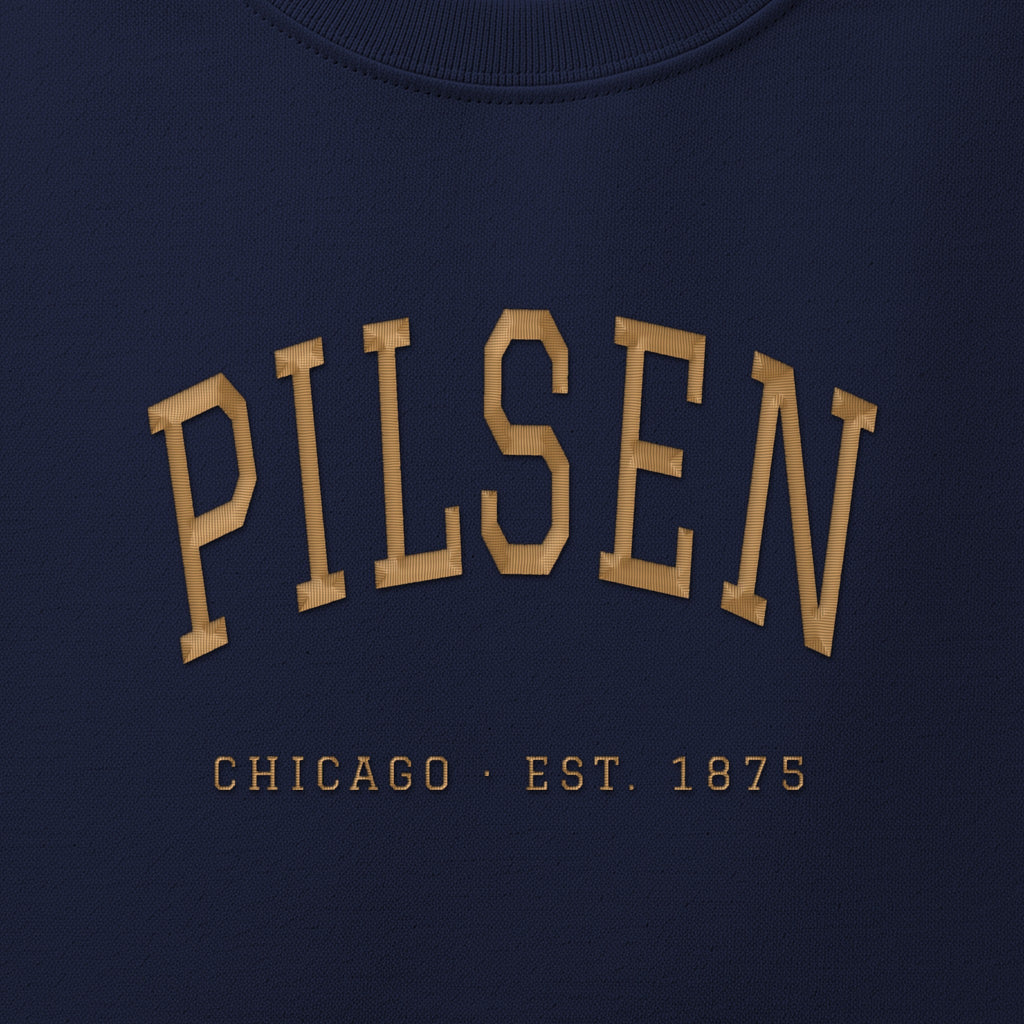 Close-up of gold satin-stitch Pilsen embroidery