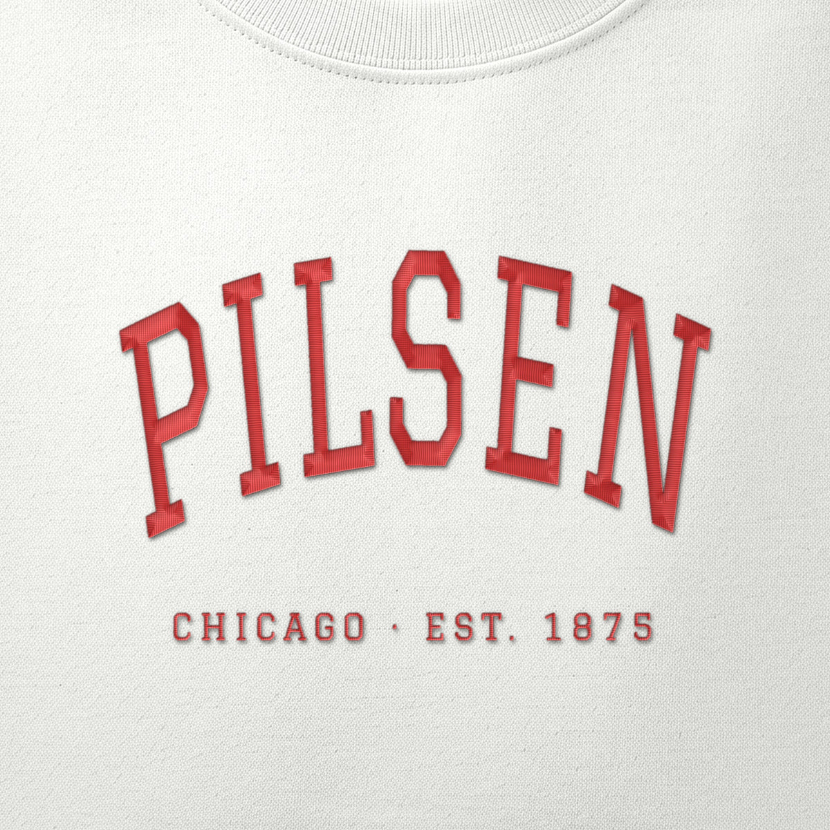 Close-up of red satin-stitch Pilsen embroidery