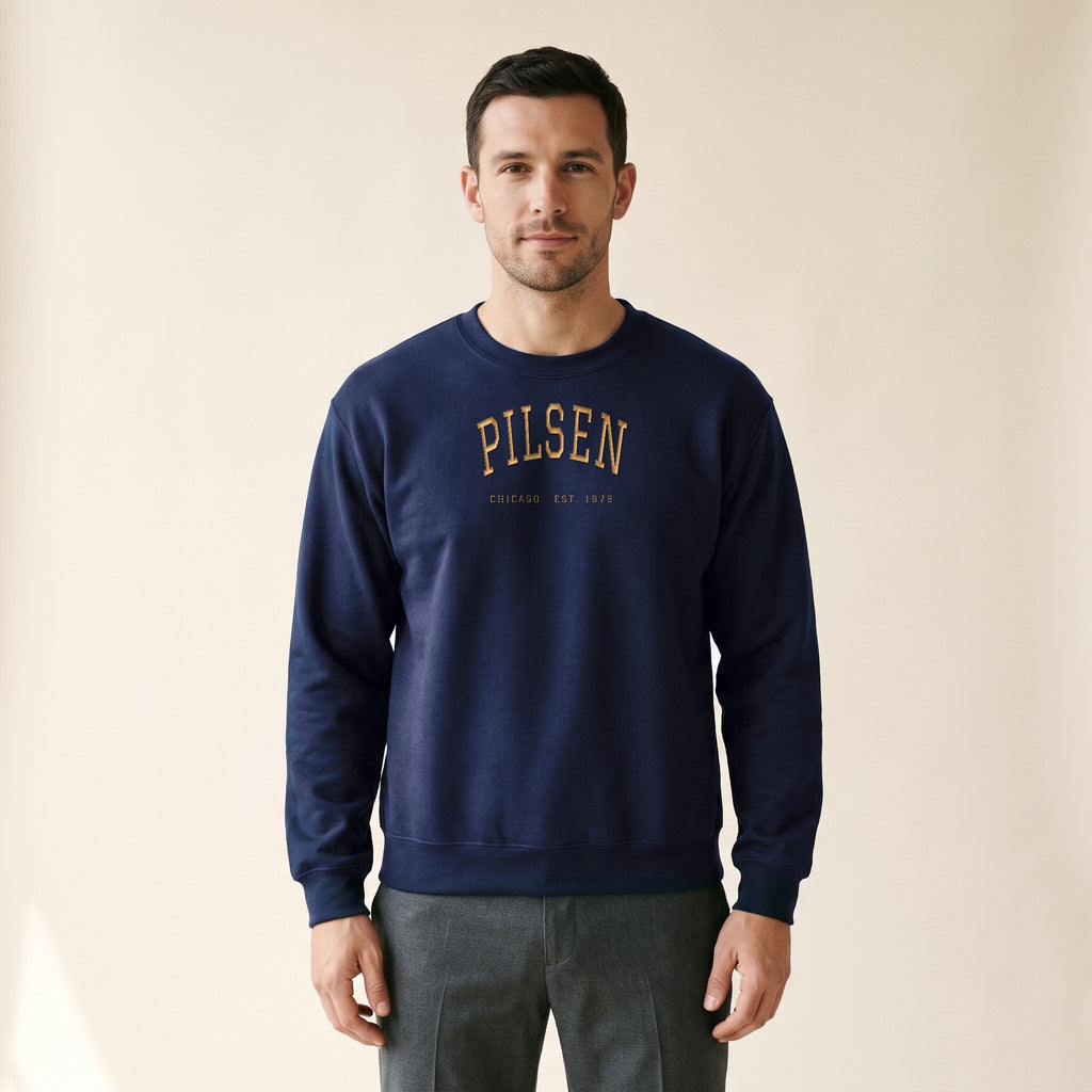 Model wearing the Pilsen Chicago Embroidered Crewneck — Gold Thread in Navy
