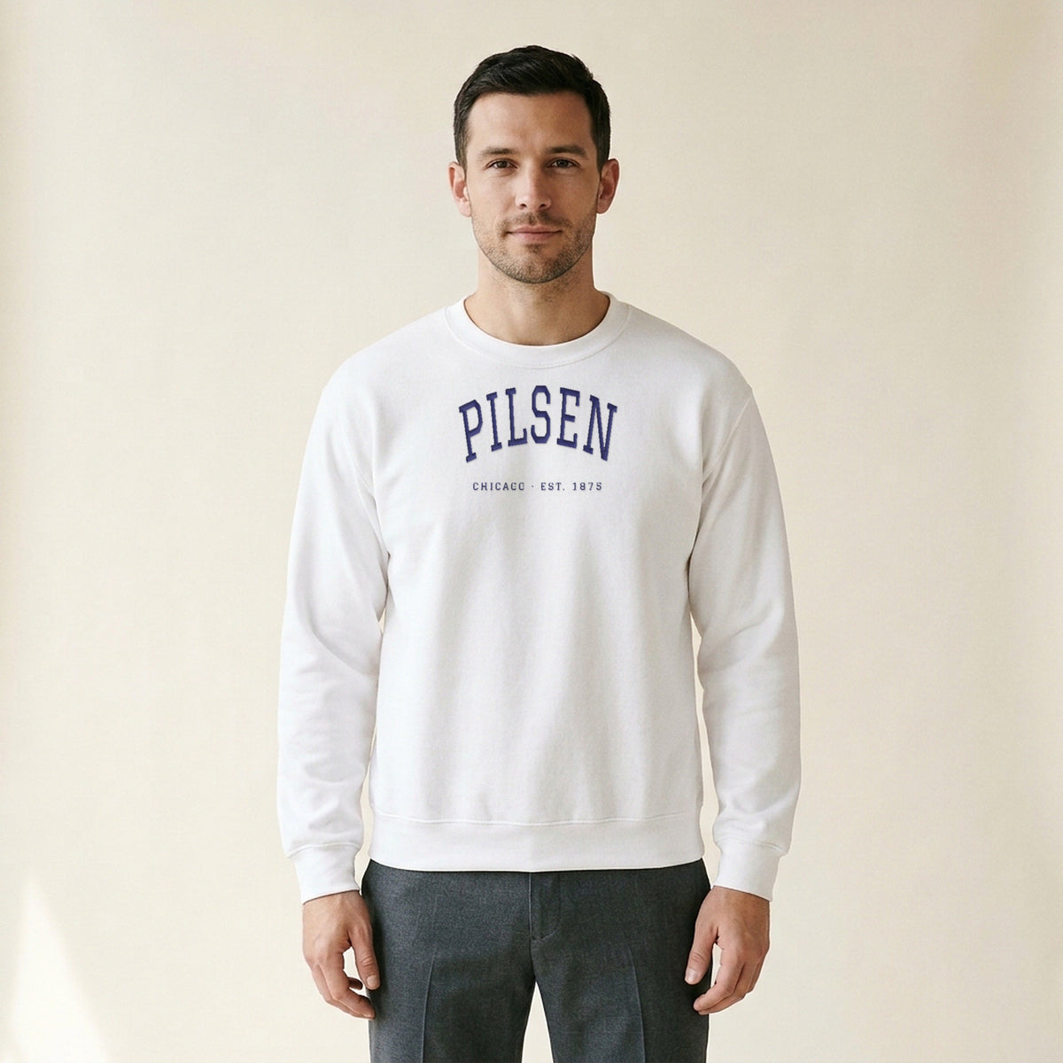 Model wearing the Pilsen Chicago Embroidered Crewneck — Navy Thread in White