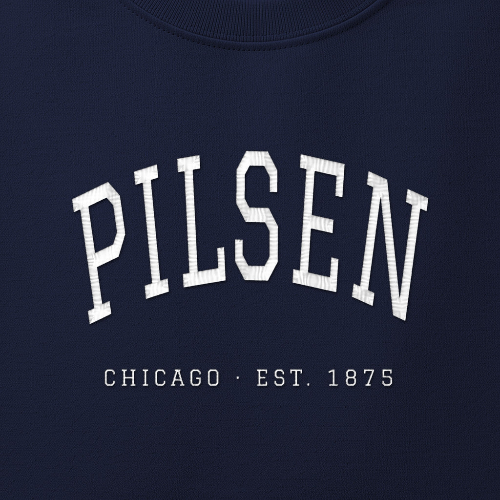 Close-up of white satin-stitch Pilsen embroidery