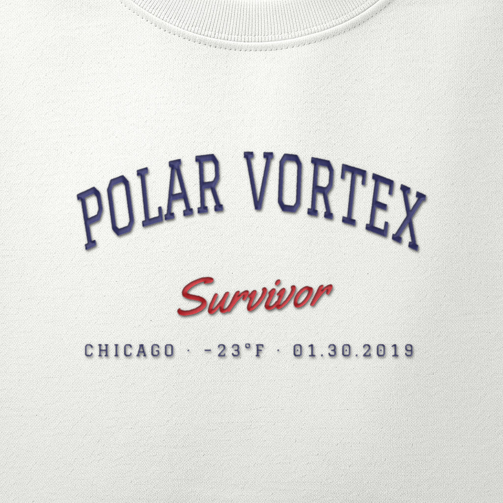 Close-up of navy and red satin-stitch Polar Vortex Survivor embroidery