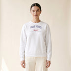 Model wearing the Polar Vortex Survivor Chicago embroidered crewneck in White, navy and red thread