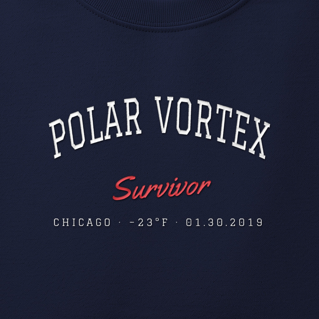 Close-up of white and red satin-stitch Polar Vortex Survivor embroidery