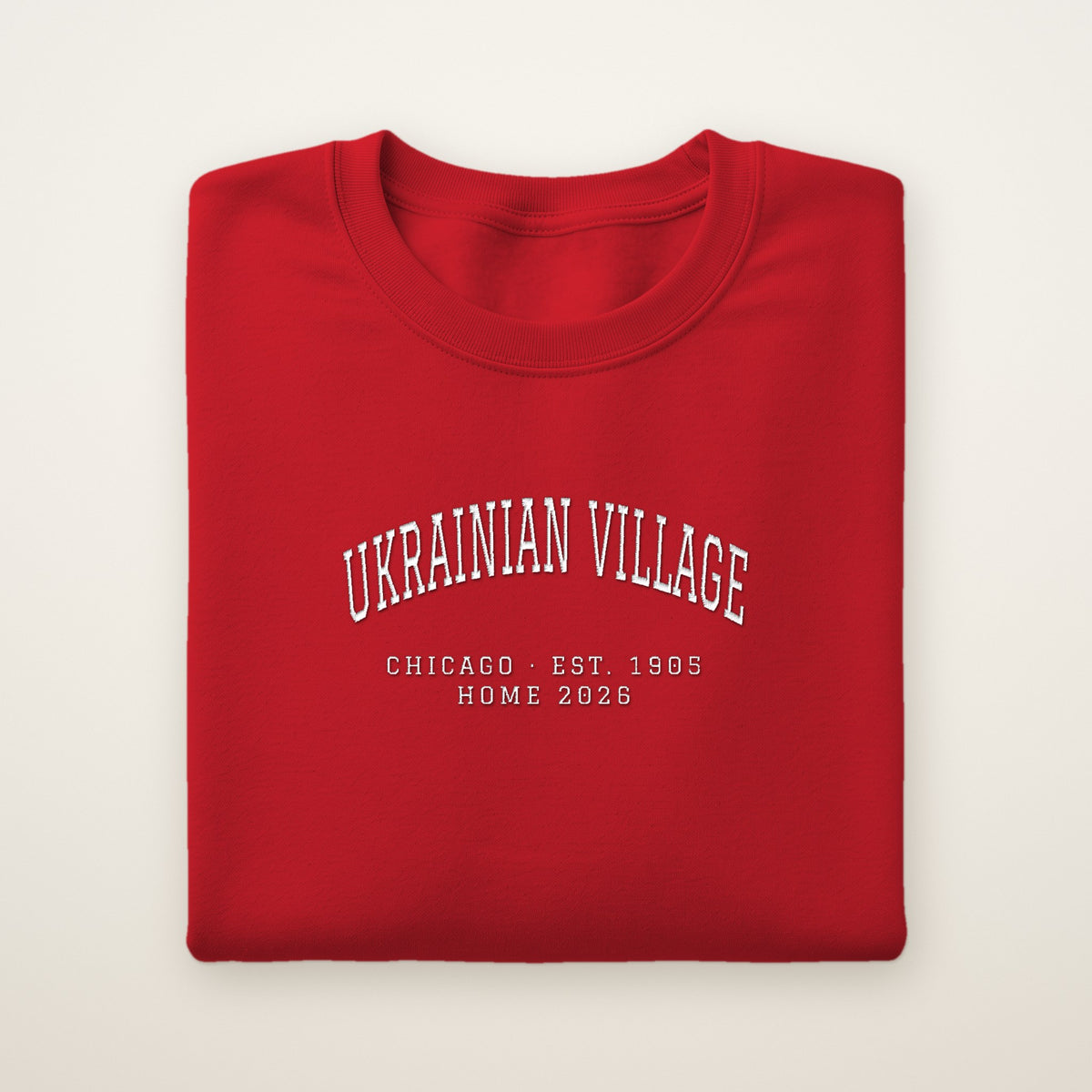 Ukrainian Village Chicago Home 2026 Embroidered Crewneck — White Thread on Red