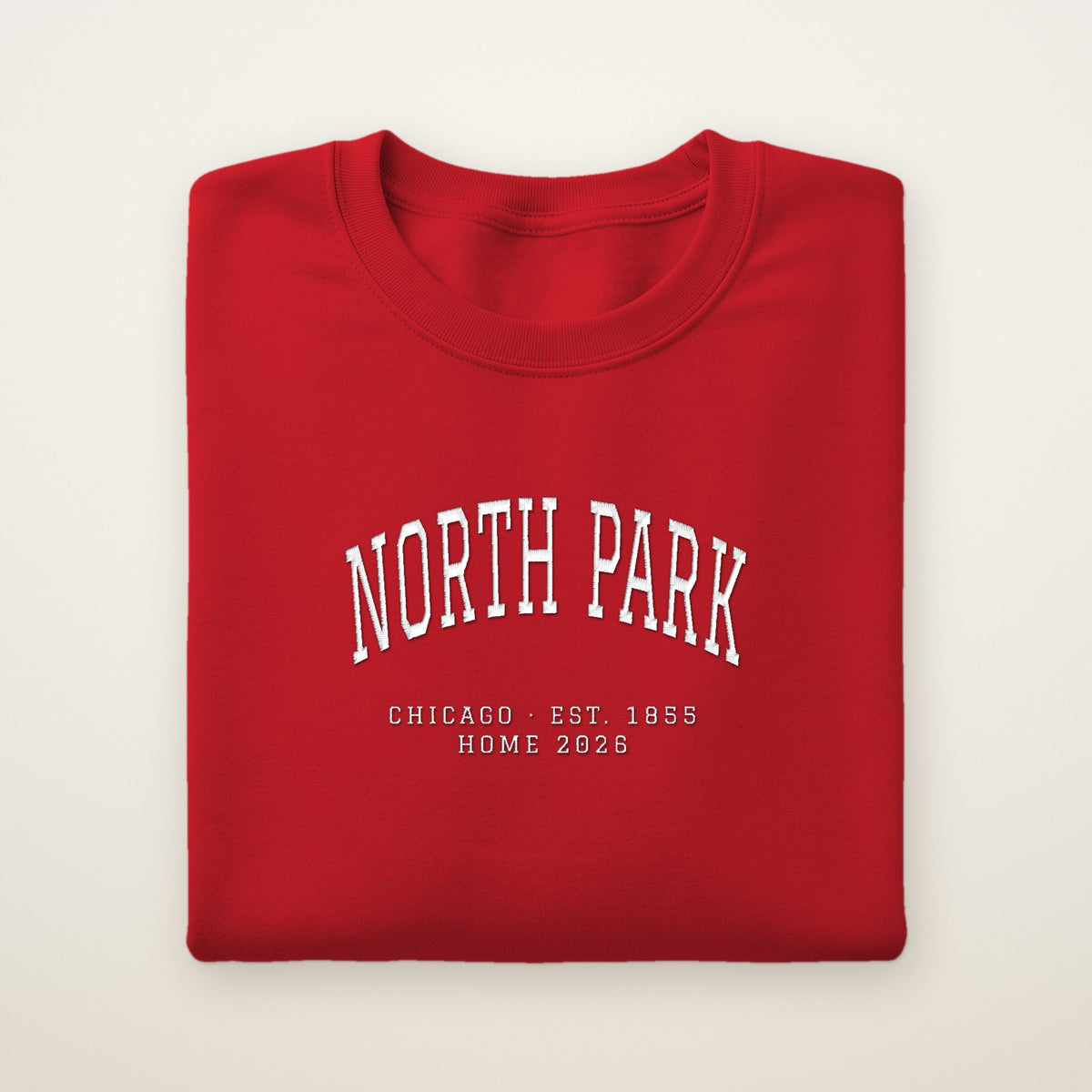 North Park Chicago Home 2026 Embroidered Crewneck — White Thread on Red