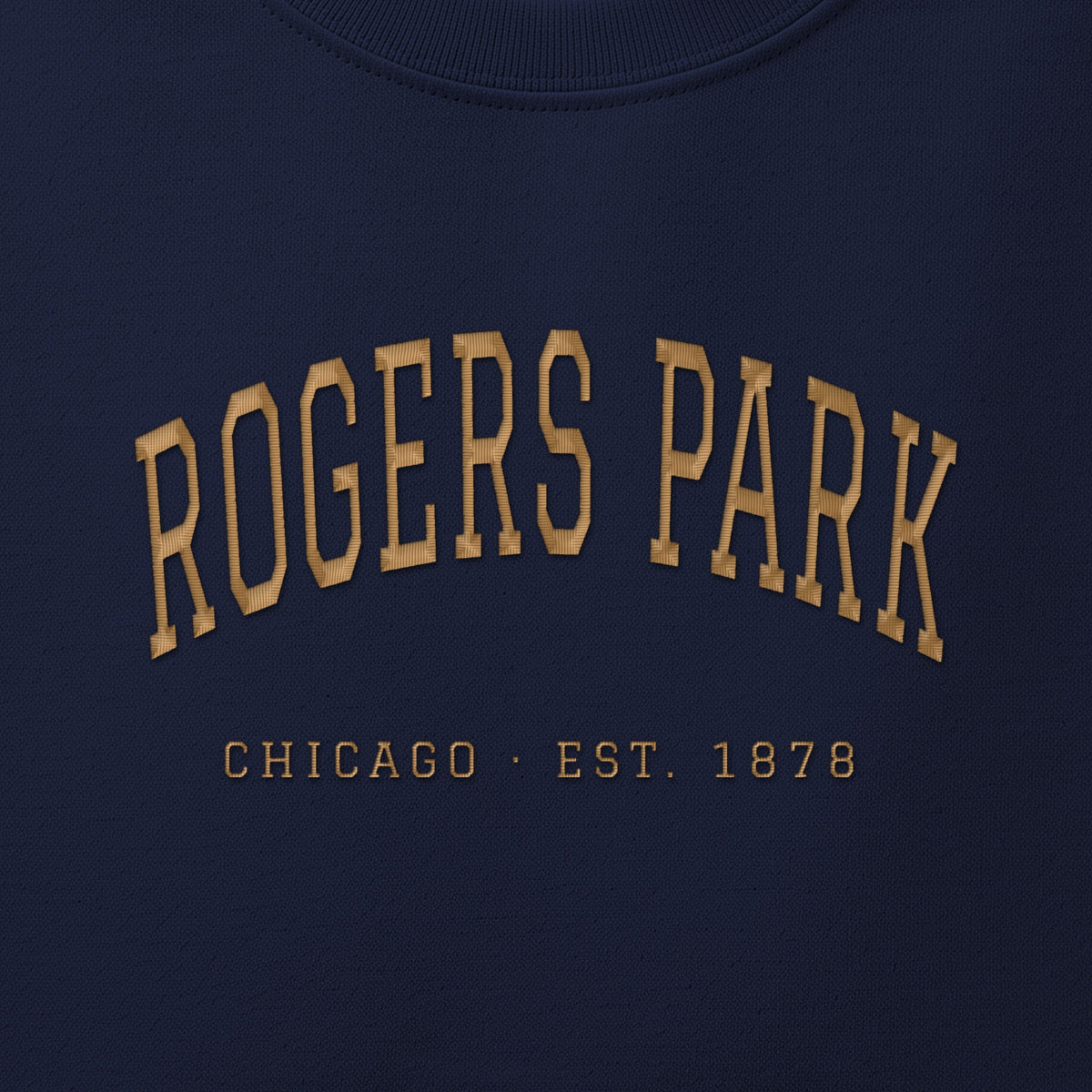 Close-up of gold satin-stitch Rogers Park embroidery