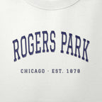 Close-up of navy satin-stitch Rogers Park embroidery