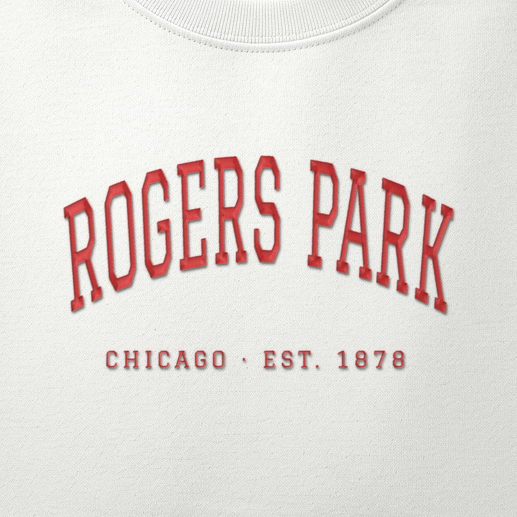Close-up of red satin-stitch Rogers Park embroidery