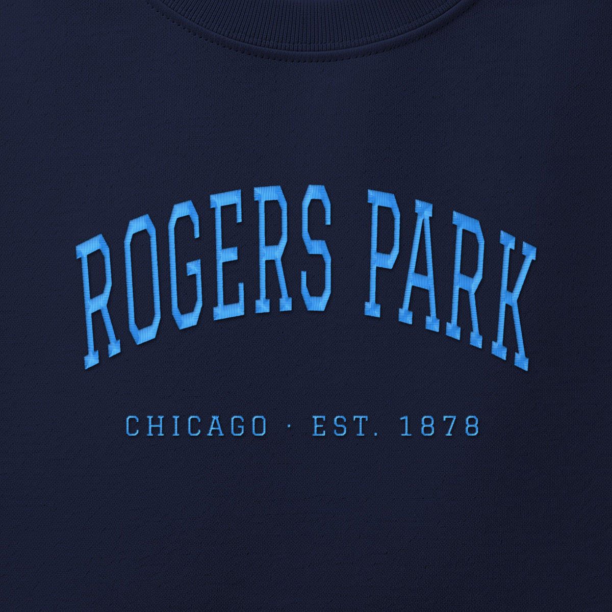 Close-up of sky blue satin-stitch Rogers Park embroidery