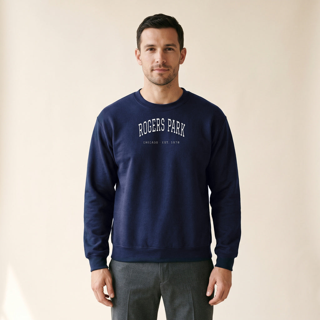 Model wearing the Rogers Park Chicago Embroidered Crewneck — White Thread in Navy