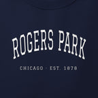 Close-up of white satin-stitch Rogers Park embroidery
