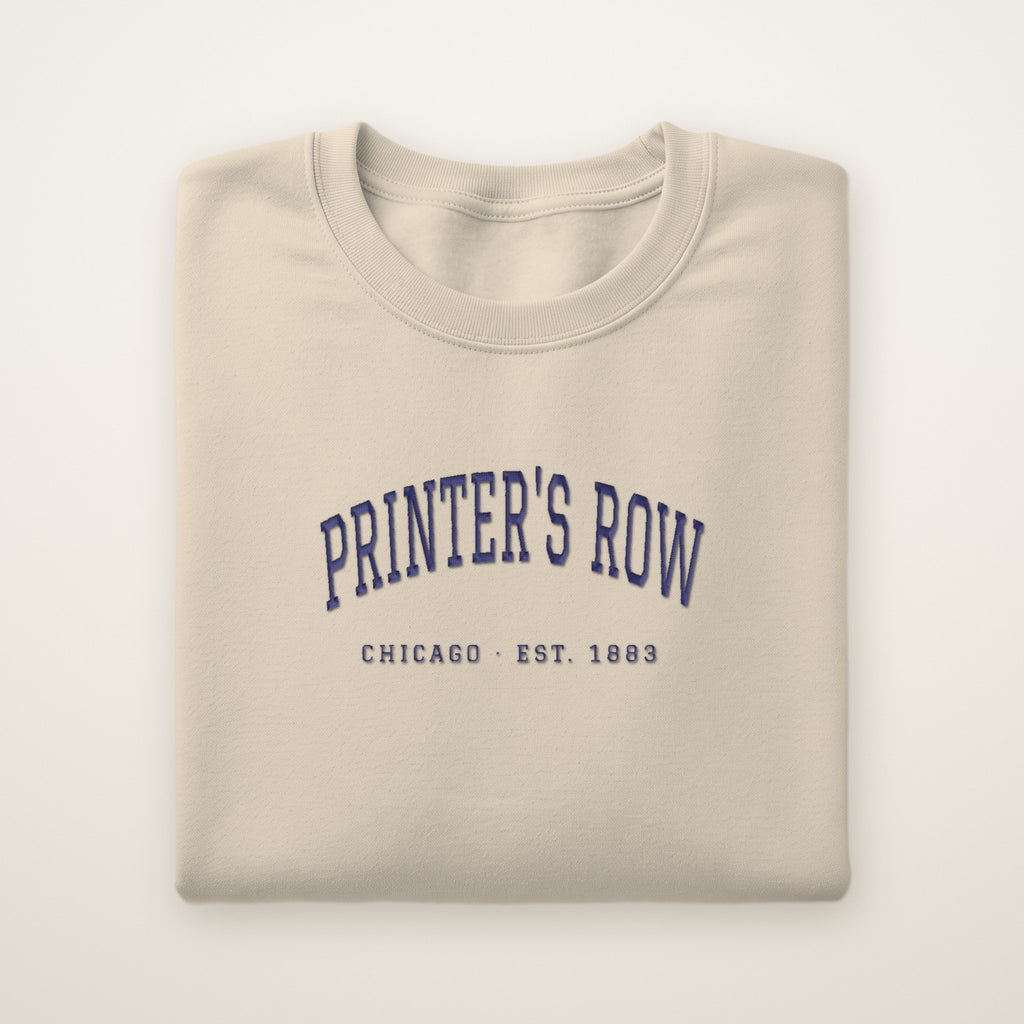 Printer's Row Chicago Embroidered Crewneck — Navy Thread on Sand