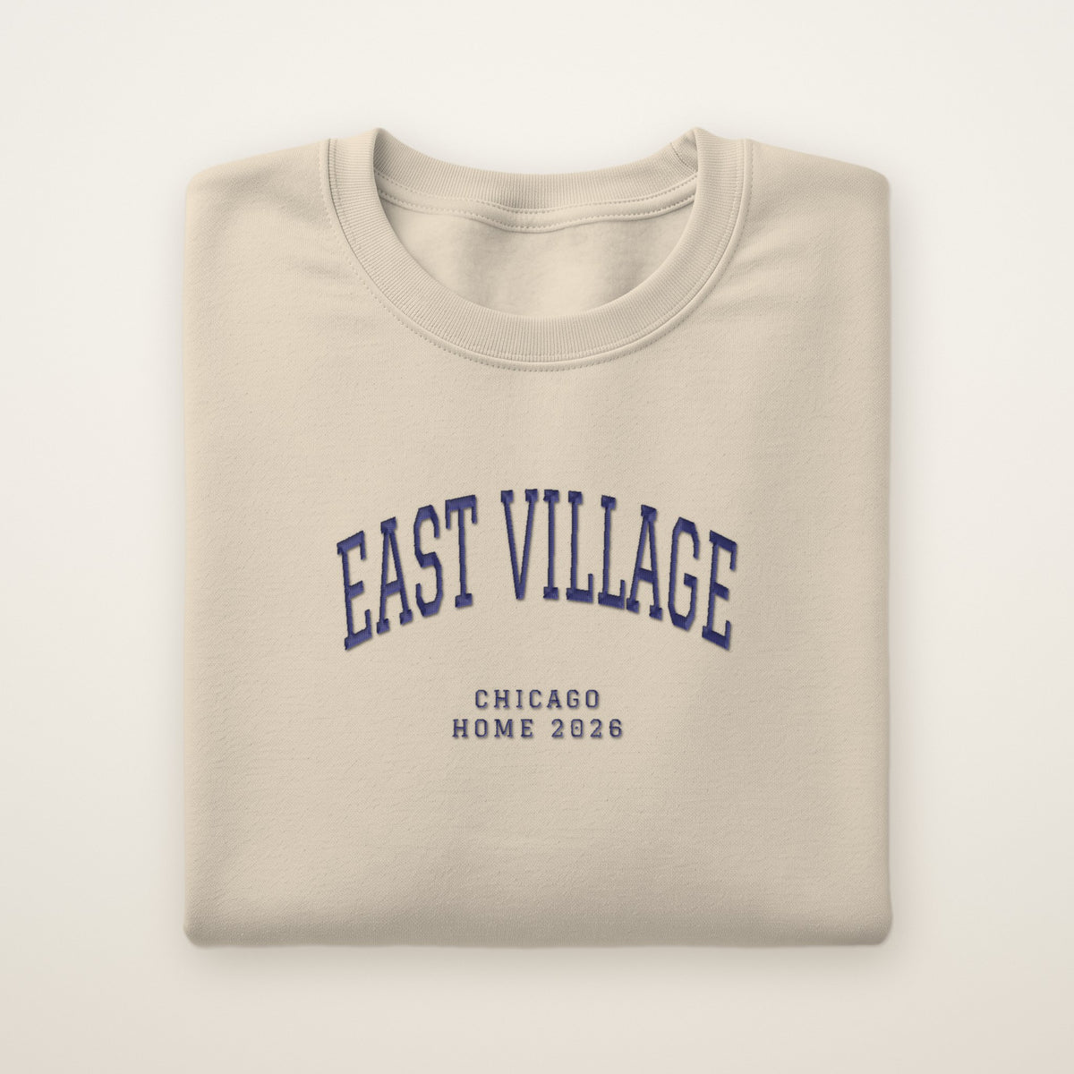 East Village Chicago Home 2026 Embroidered Crewneck — Navy Thread on Sand