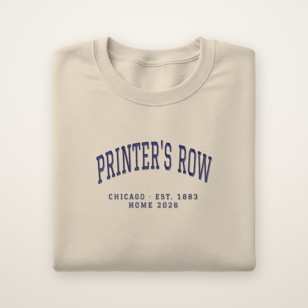 Printer's Row Chicago Home 2026 Embroidered Crewneck — Navy Thread on Sand