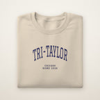 Tri-Taylor Chicago Home 2026 Embroidered Crewneck — Navy Thread on Sand