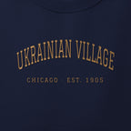 Close-up of gold satin-stitch Ukrainian Village embroidery
