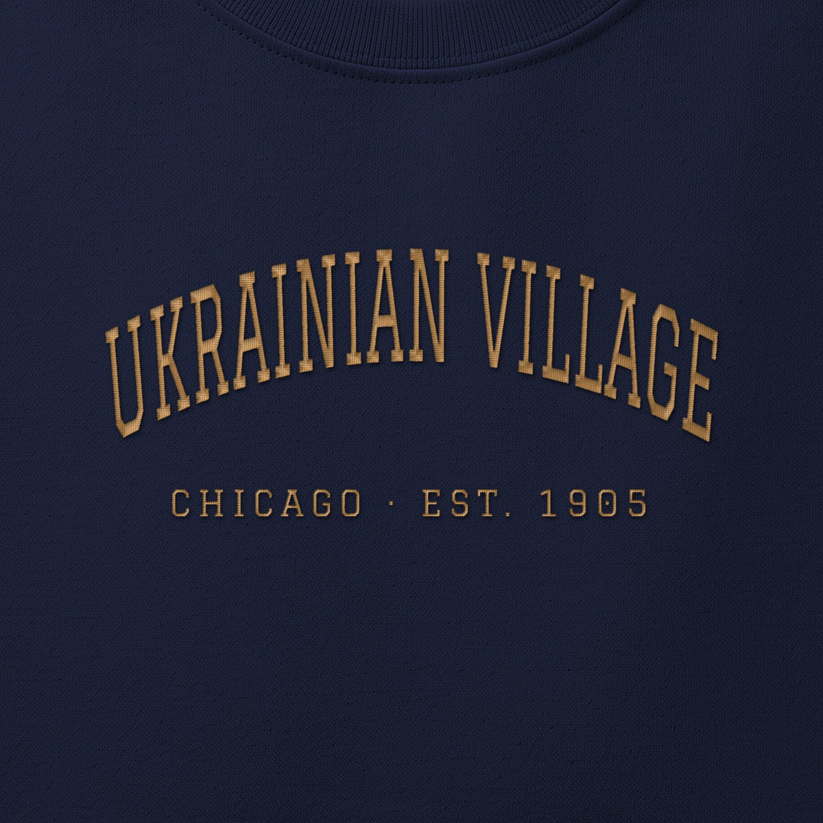 Close-up of gold satin-stitch Ukrainian Village embroidery