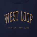 Close-up of gold satin-stitch West Loop embroidery