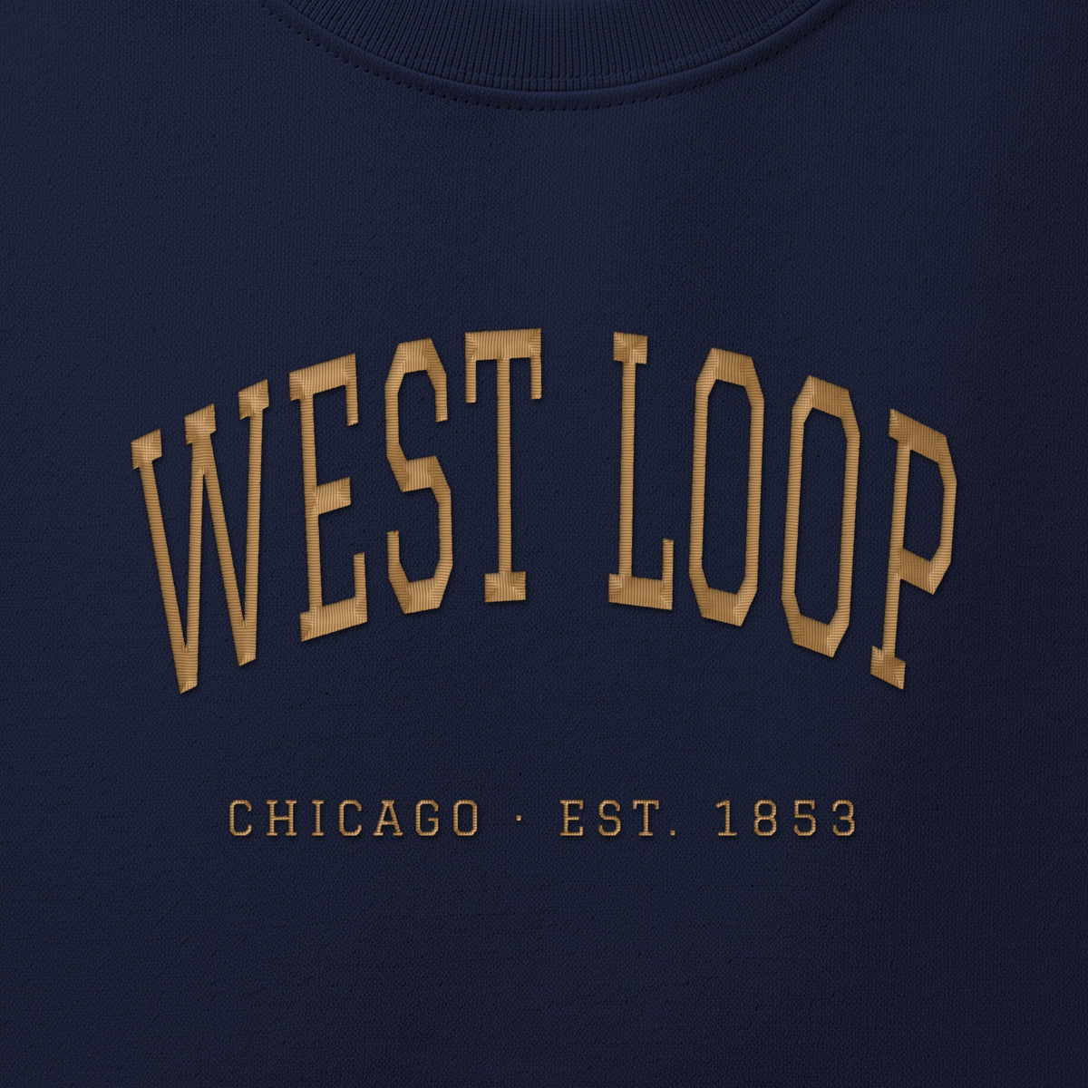 Close-up of gold satin-stitch West Loop embroidery