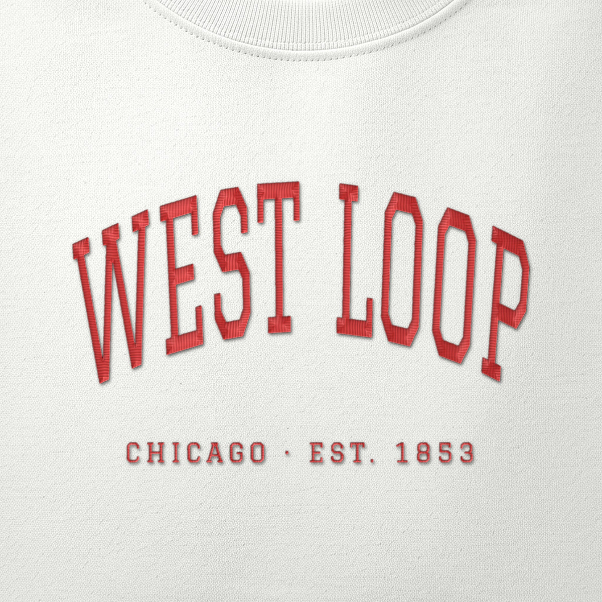 Close-up of red satin-stitch West Loop embroidery