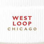 West Loop Chicago embroidery close-up in red and old gold thread