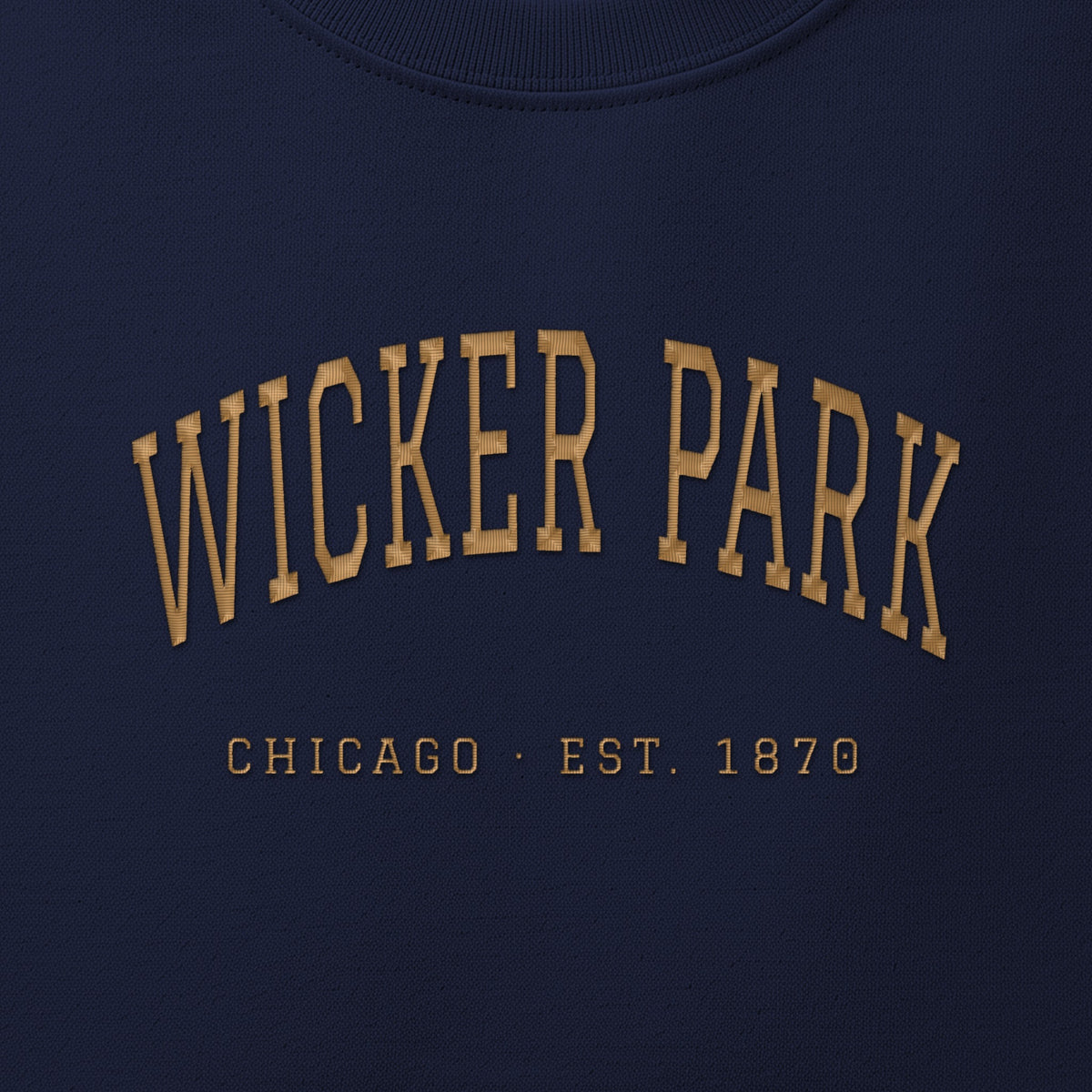 Close-up of gold satin-stitch Wicker Park embroidery