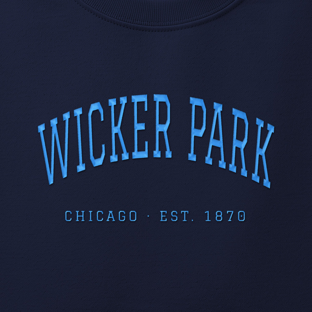 Close-up of sky blue satin-stitch Wicker Park embroidery