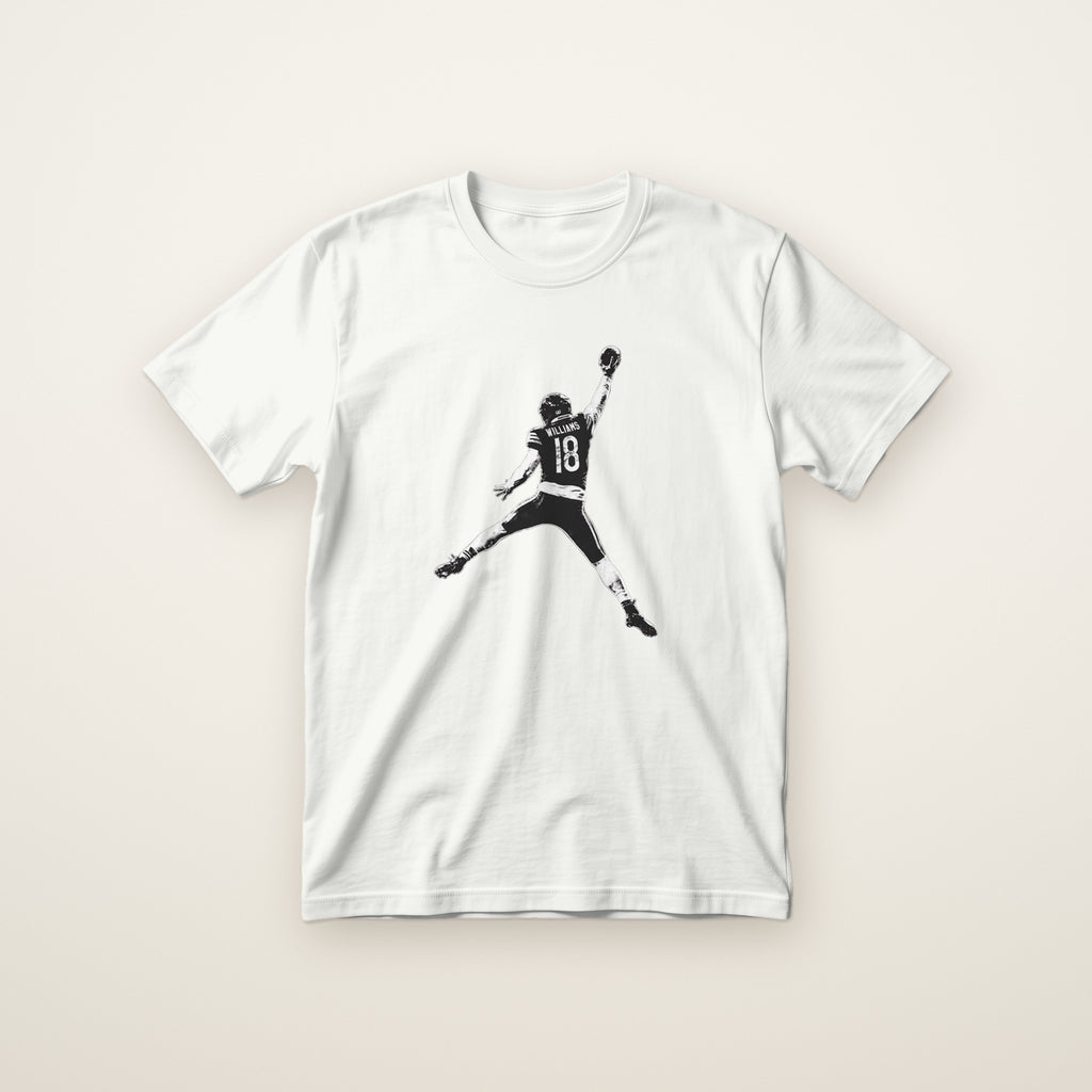Youth Caleb Williams Jump Man Tee in White, flat lay on ivory
