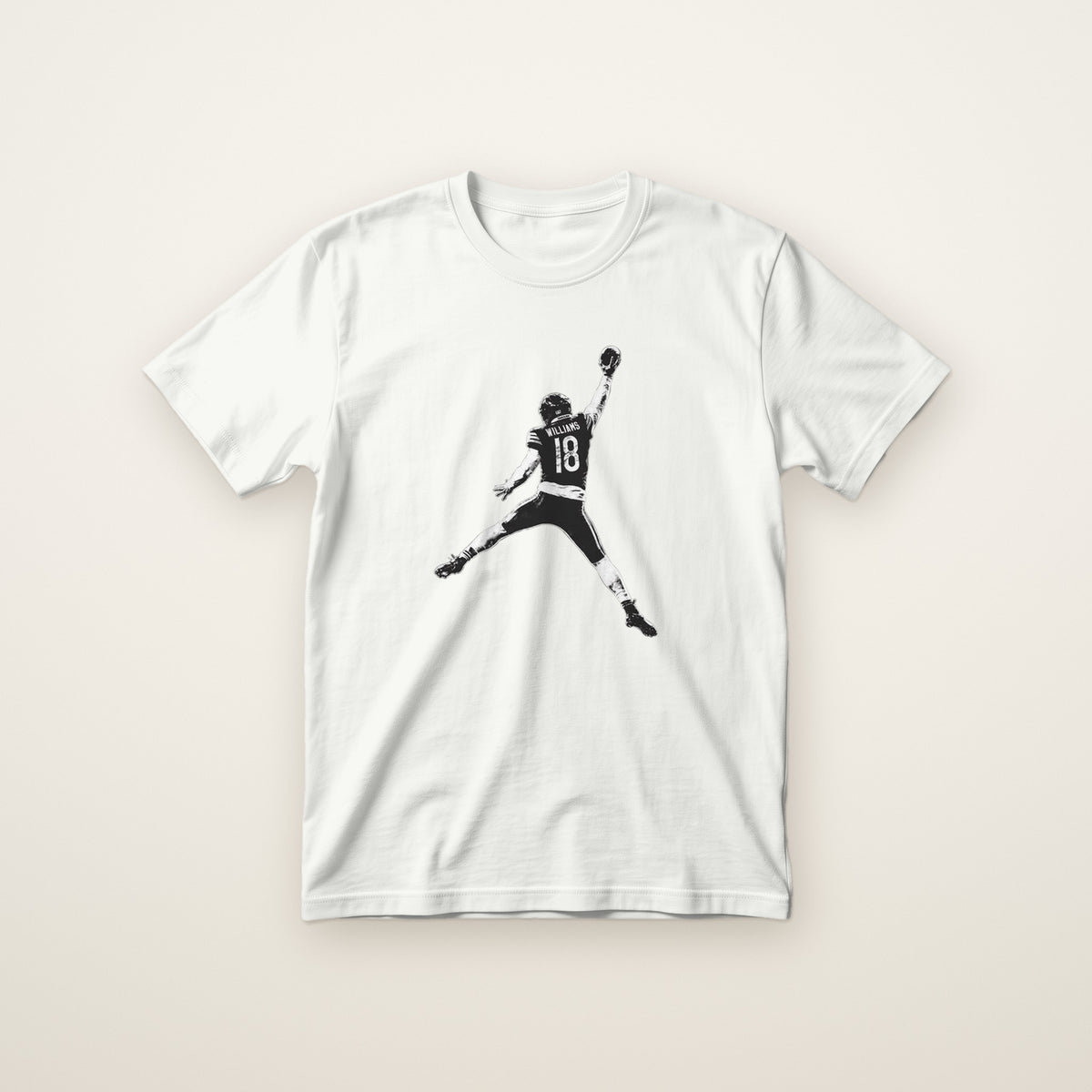 Youth Caleb Williams Jump Man Tee in White, flat lay on ivory