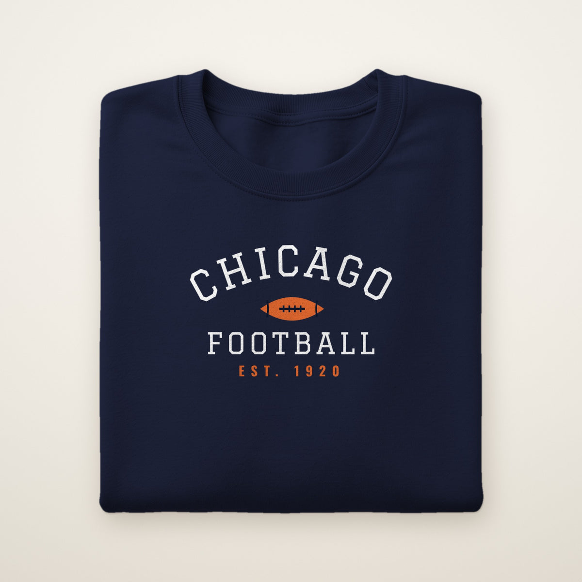 Youth Chicago Football Crewneck — Est. 1920 in Navy, flat lay on ivory