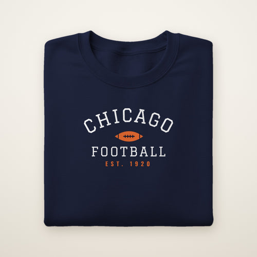Youth Chicago Football Crewneck — Est. 1920 in Navy, flat lay on ivory