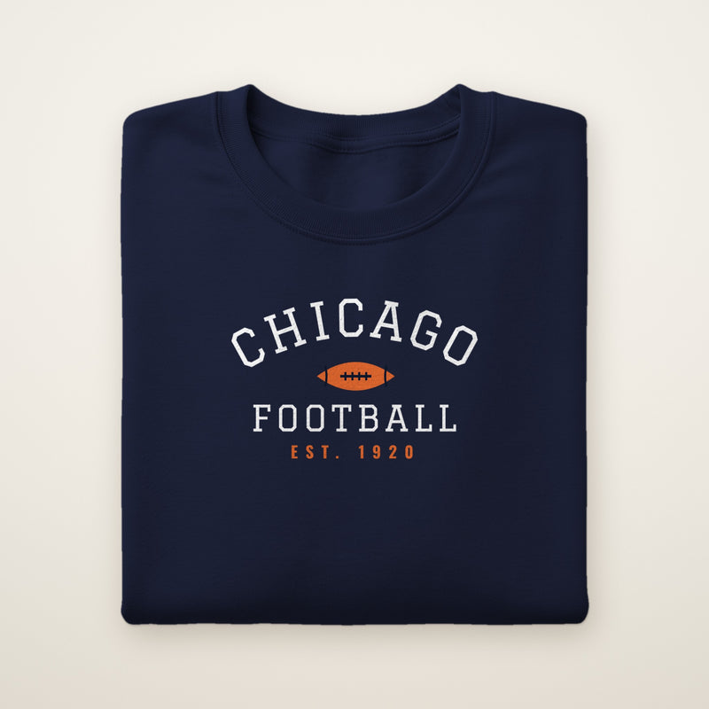 Youth Chicago Football Crewneck — Est. 1920 in Navy, flat lay on ivory