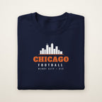 Youth Chicago Skyline Football Crewneck — 312 in Navy, flat lay on ivory